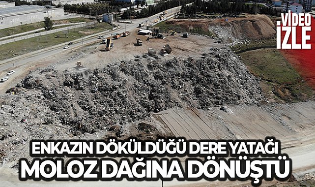Enkazın döküldüğü dere yatağı moloz dağına dönüştü