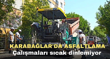 Karabağlar'da asfaltlama çalışmaları sıcak dinlemiyor