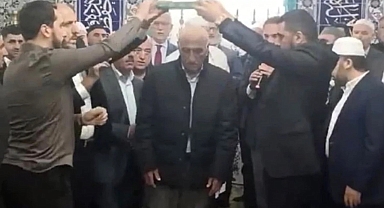 Kur'an-ı Kerim'in altından geçerek barış ilan ettiler